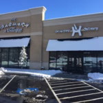 Pharmacy building with snow-covered awnings