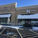 Pharmacy building with snow-covered roof