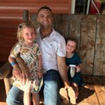Smiling family enjoying sunny day together