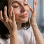 Relaxed woman enjoying skincare routine