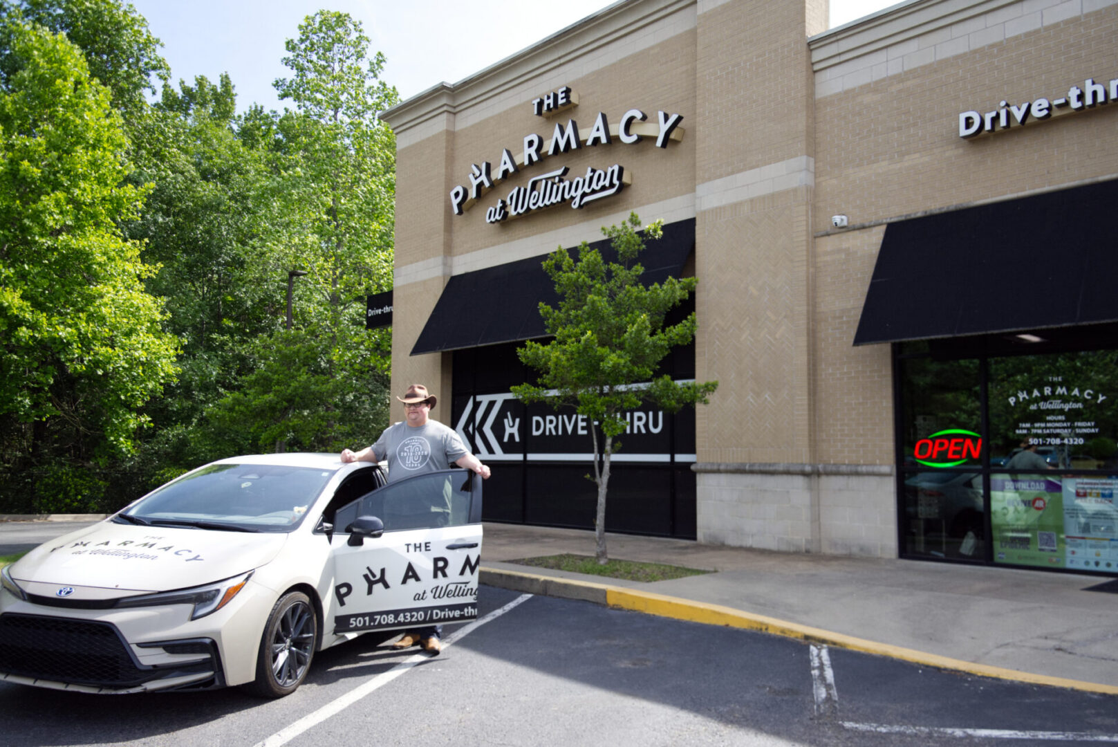 Dave driver at car in front of store